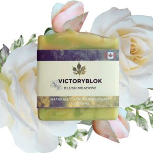 Blush Meadow natural soap bar with soft clay hues and botanical tones, handcrafted with nourishing plant oils and a bright floral‑herbal aroma.