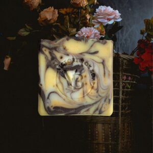 Gold Leaf Whisper natural soap bar with warm golden clay tones and a soft floral aroma, handcrafted with nourishing plant oils.